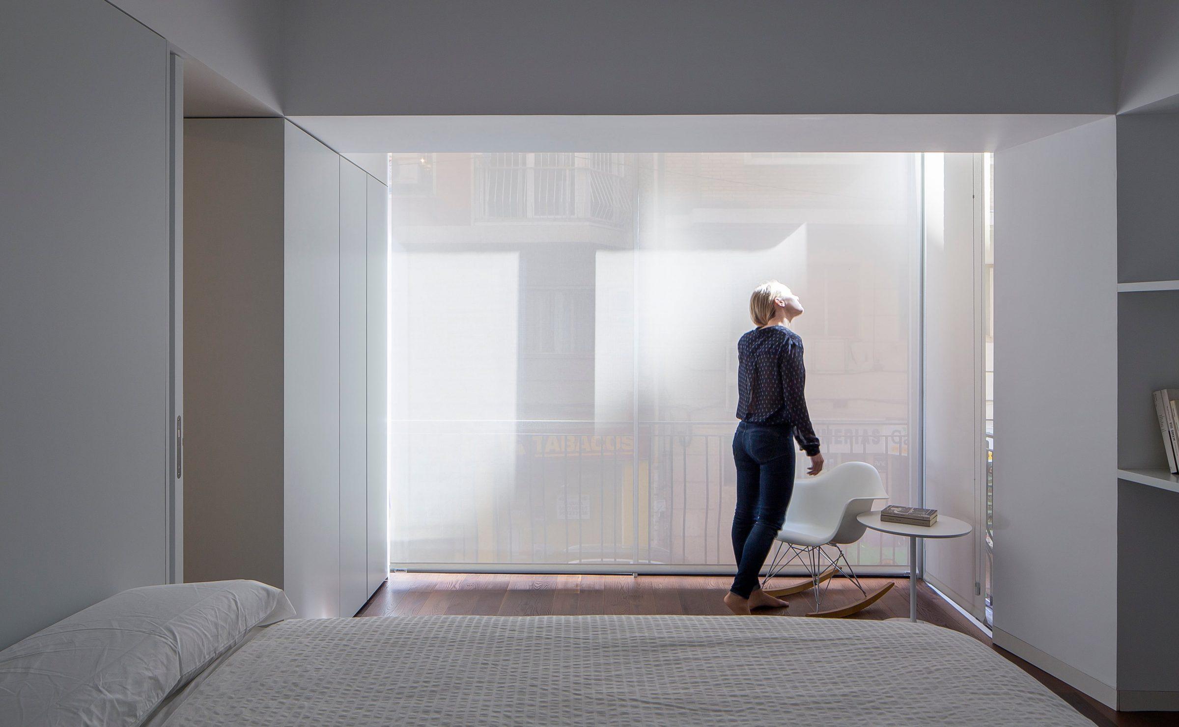 Murcia Apartment, the bedroom opening onto the street balcony