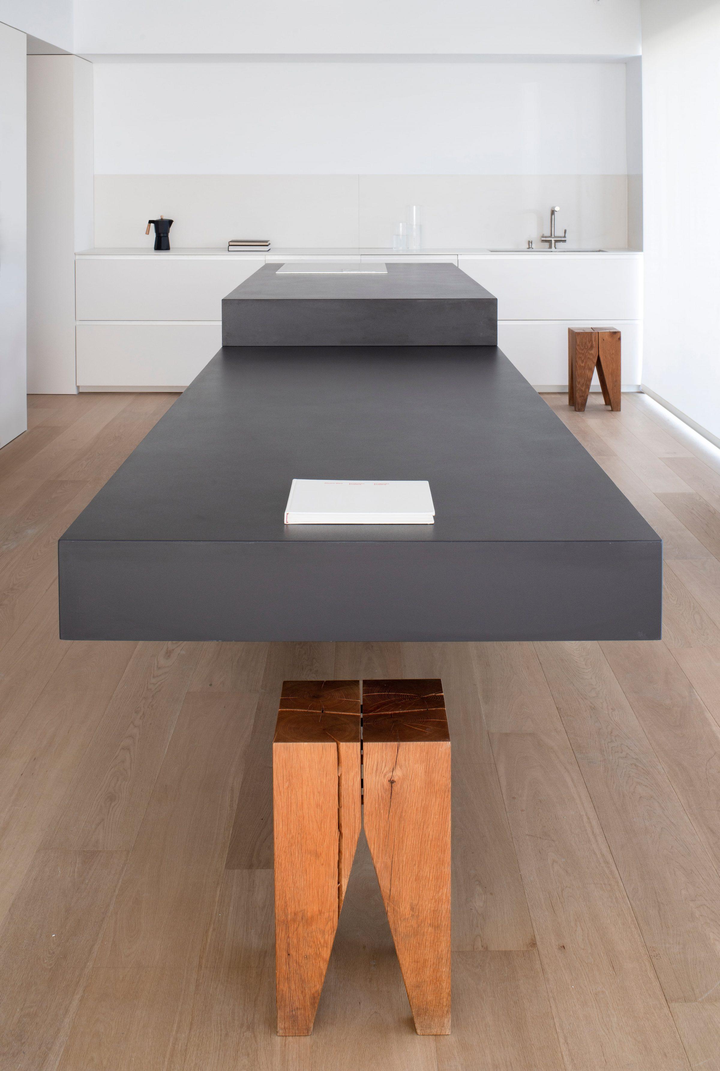 Orihuela Apartment, the long view down the cantilevered island towards the kitchen