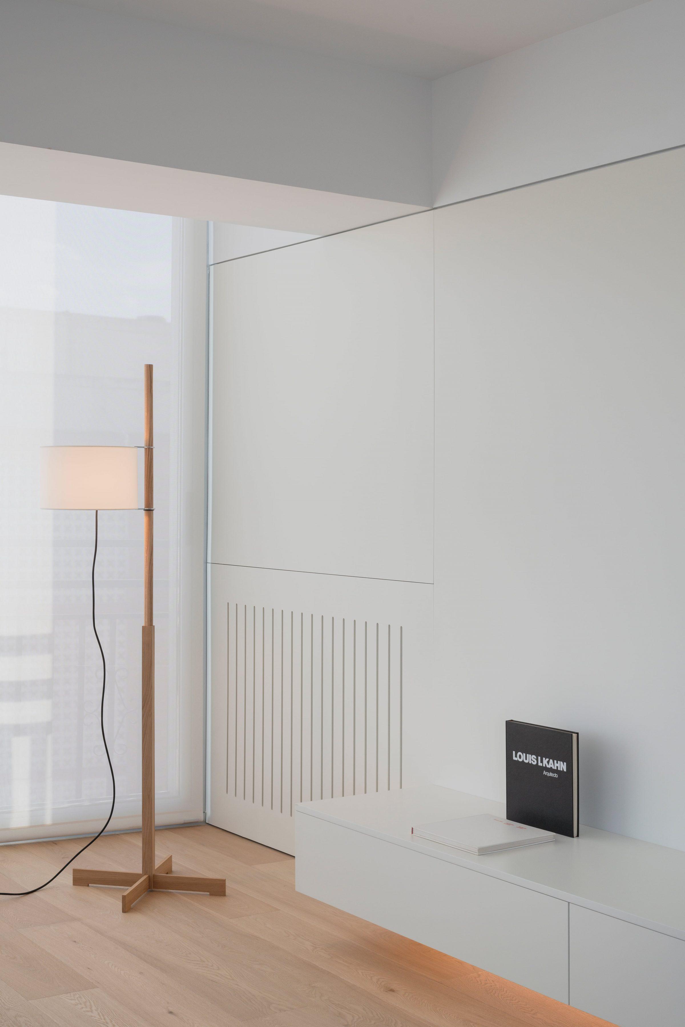 Orihuela Apartment, a corridor flanked by built-in joinery on both sides