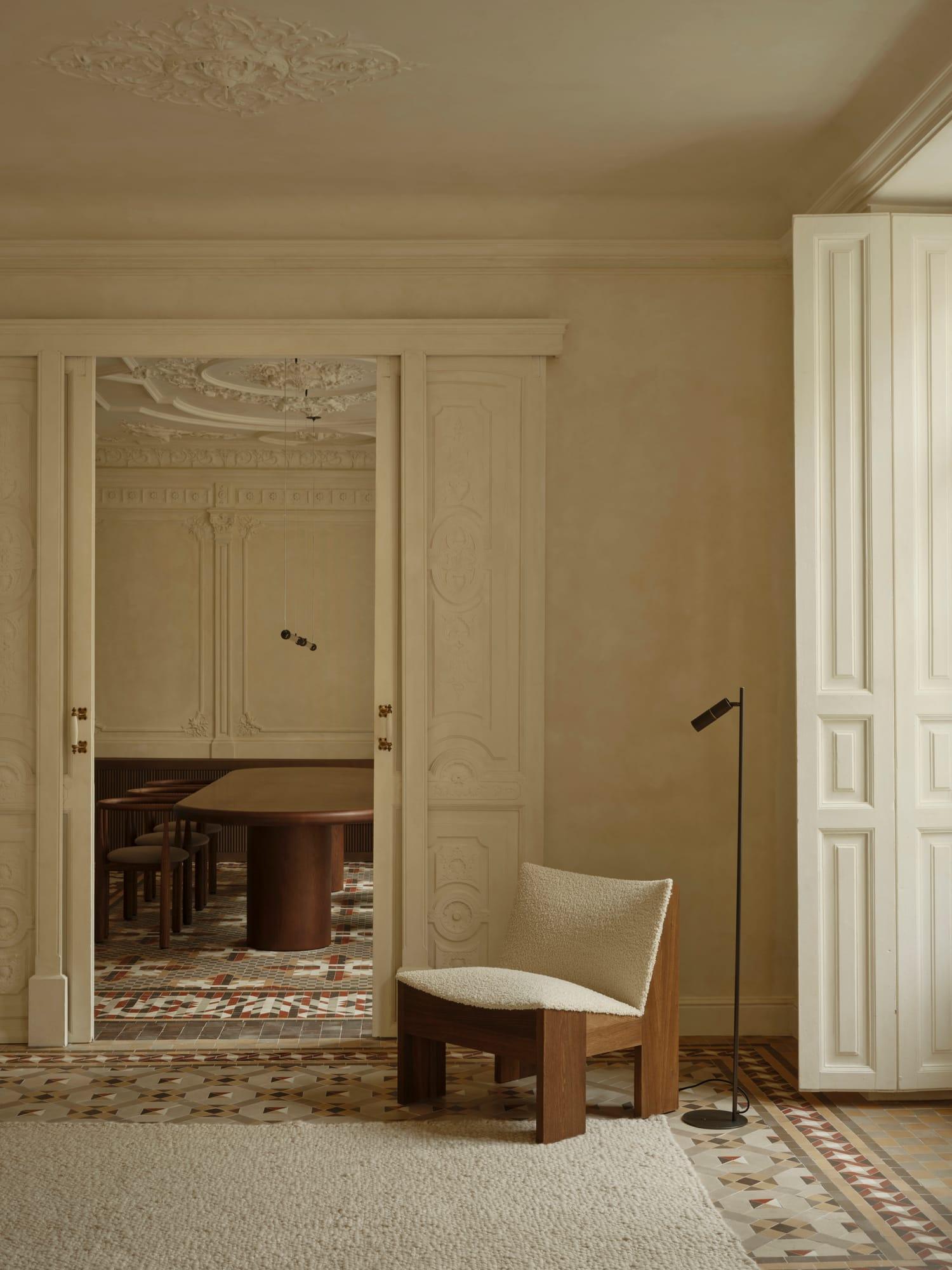 Ciutat Vella Apartment — view through the carved period doors along the enfilade