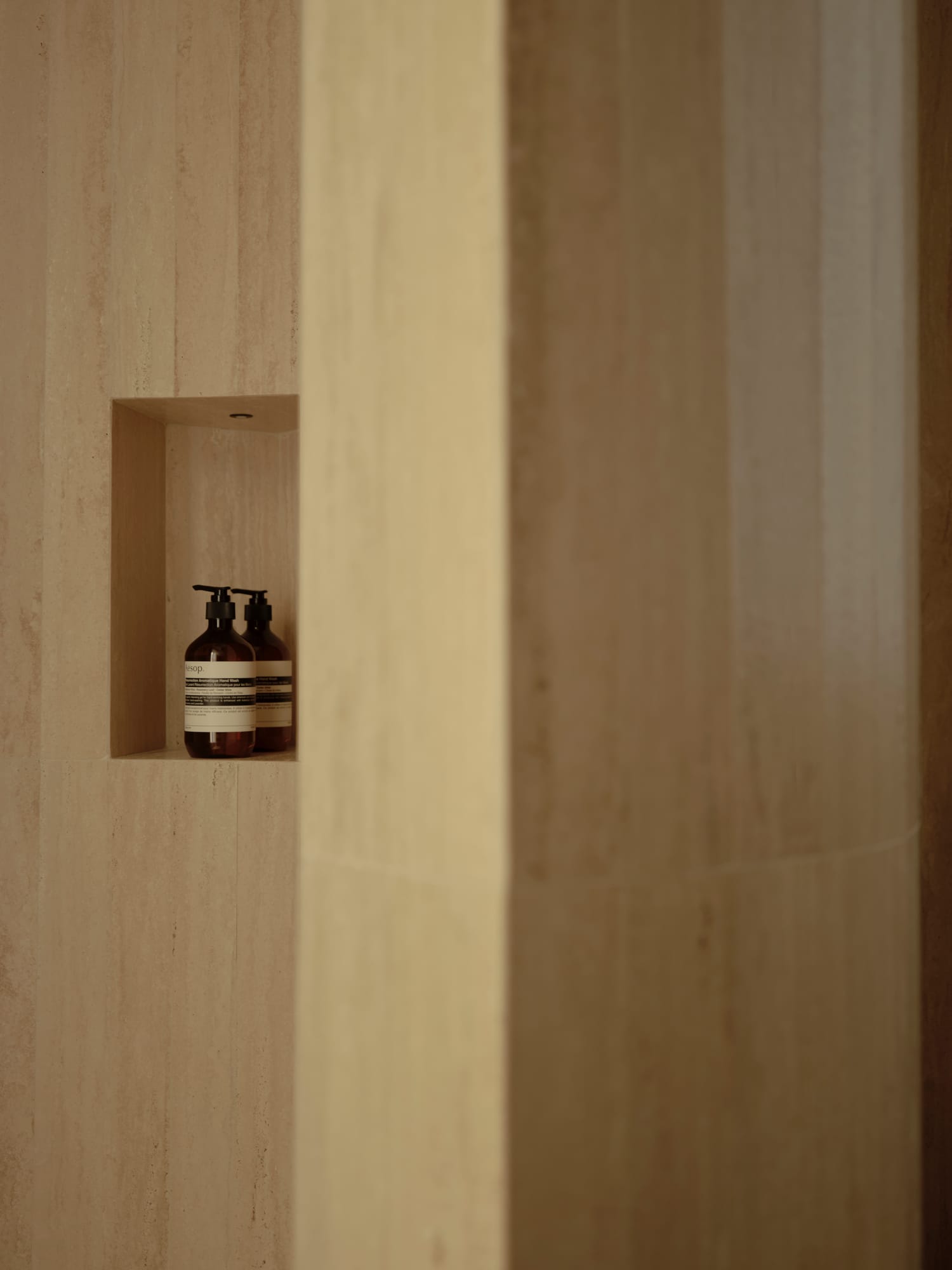 Ciutat Vella Apartment — travertine niche detail