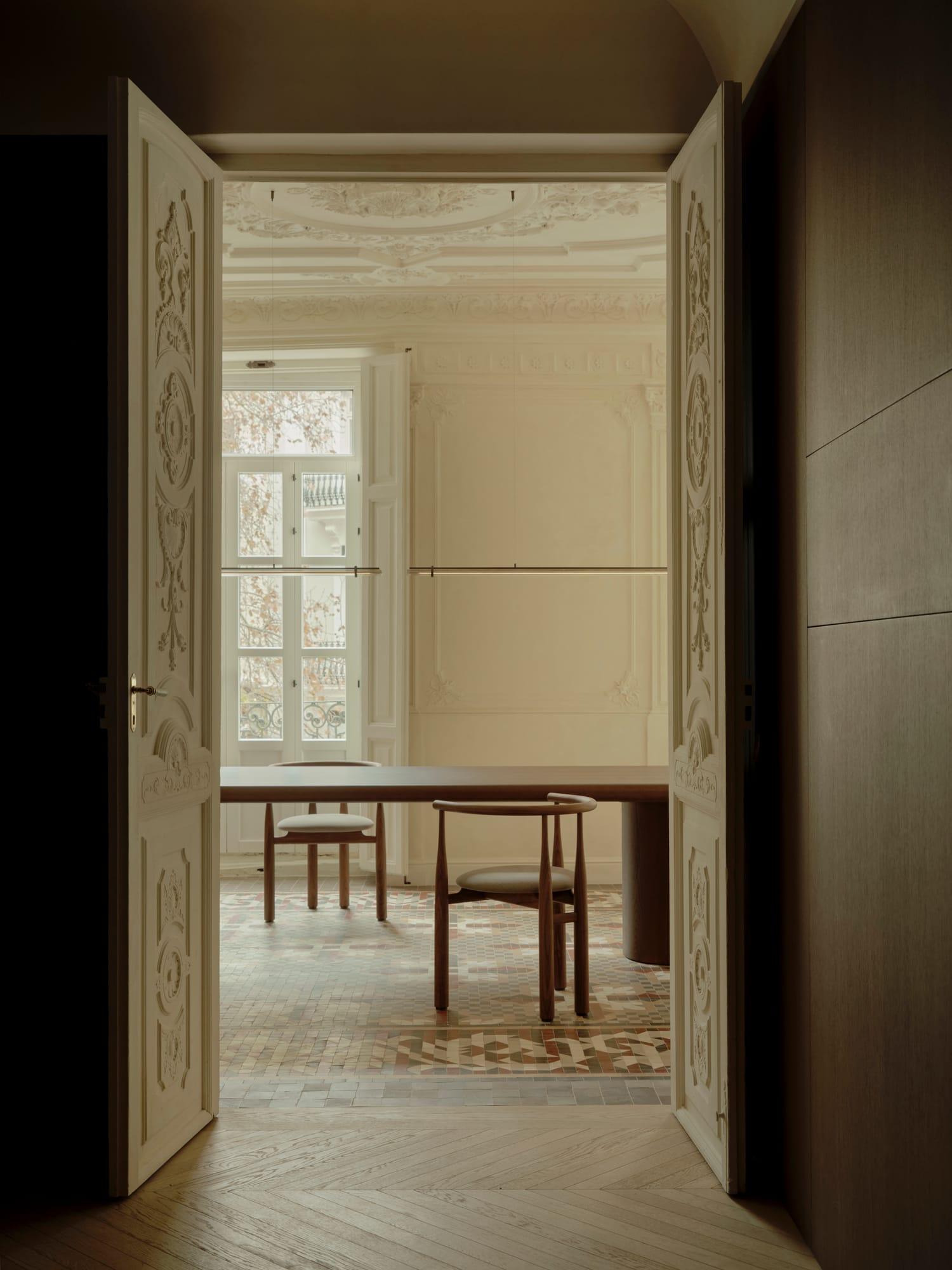 Ciutat Vella Apartment — shuttered window and Nolla mosaic in the public rooms