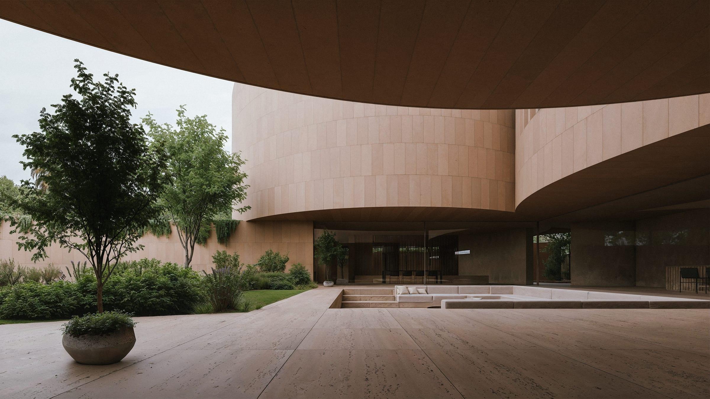 Round House — central courtyard, volumes lifted over a glazed ground floor