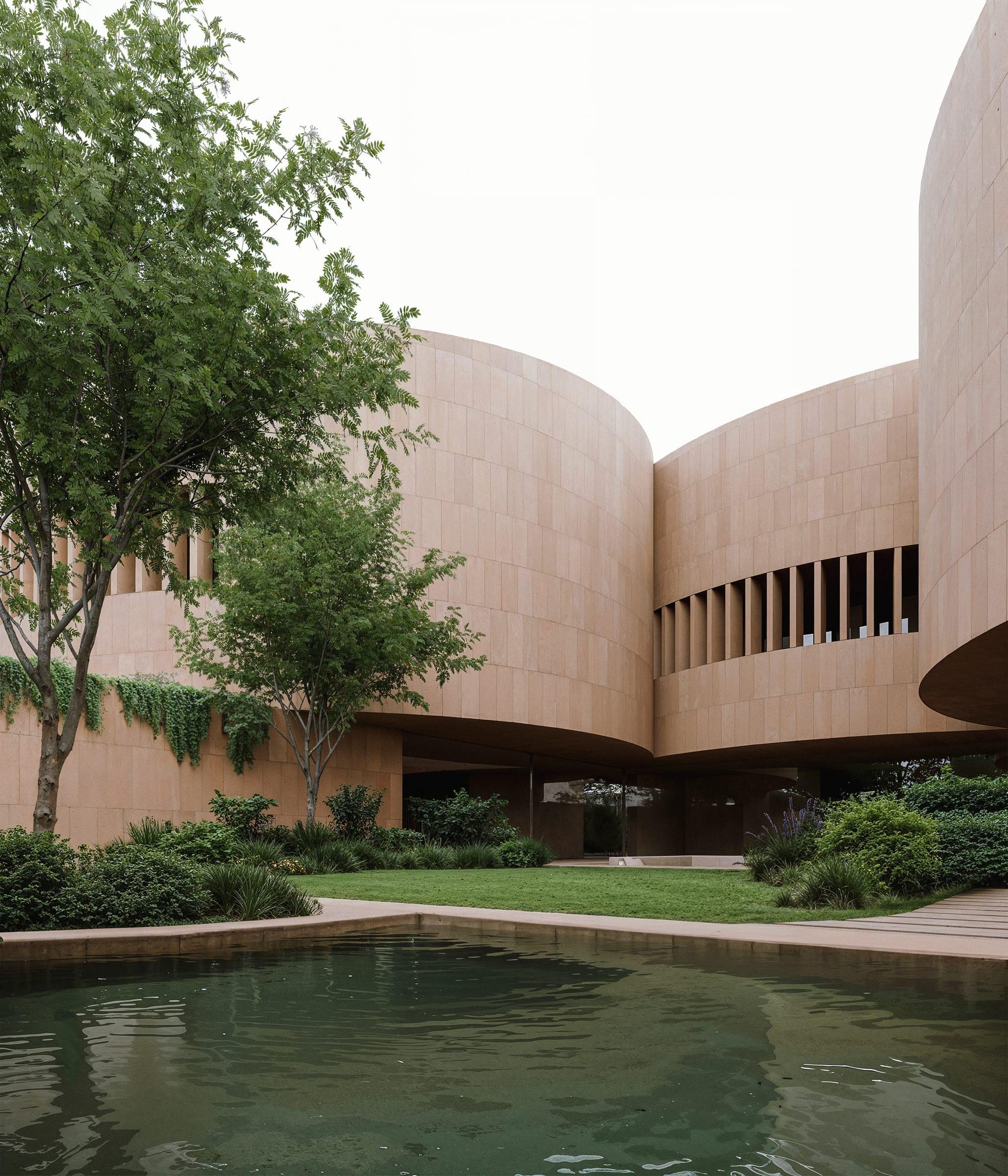 Round House — curved volume and vaulted soffit over the courtyard