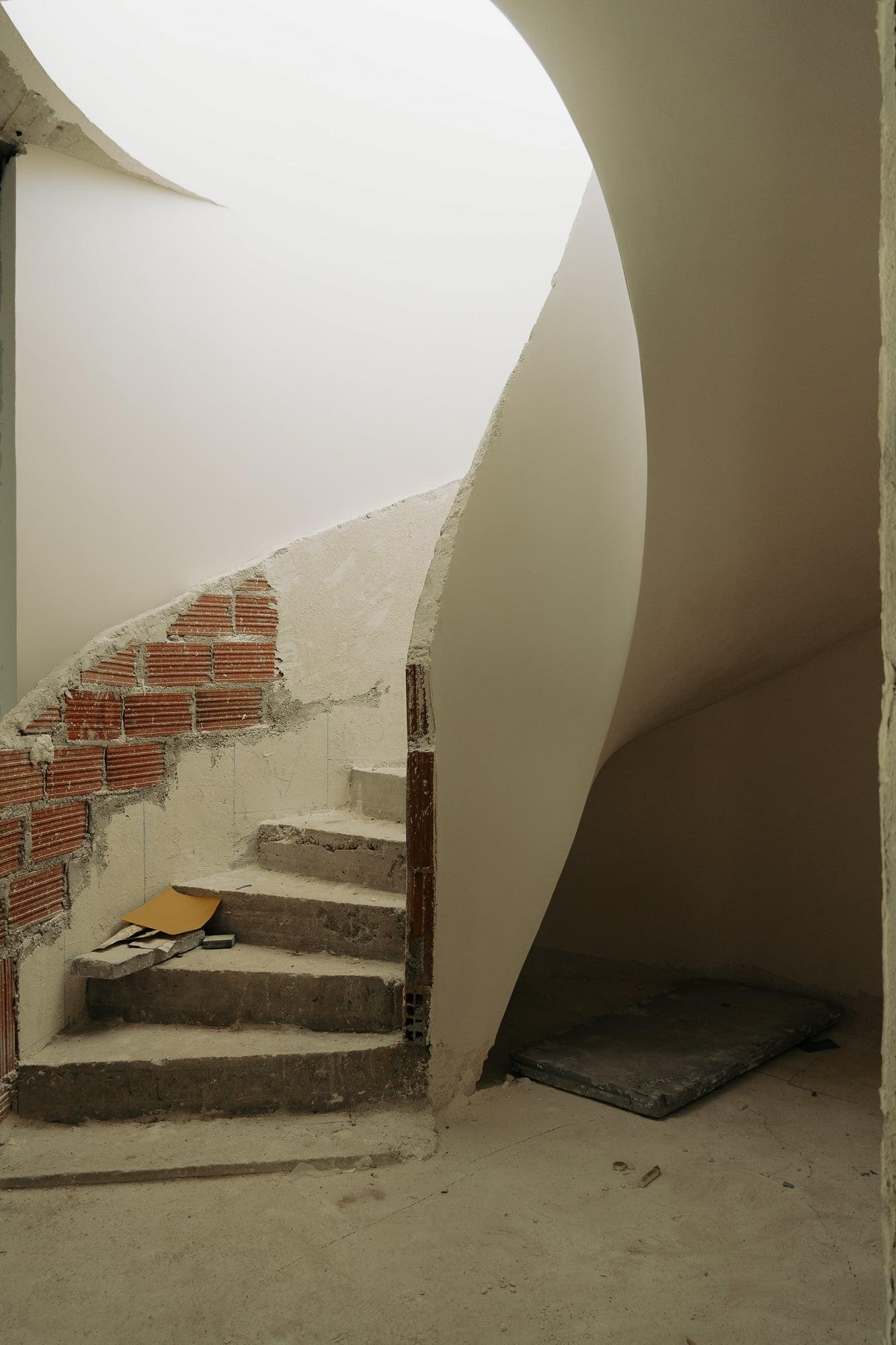 Curved stair under construction, Bunker House, Ibiza