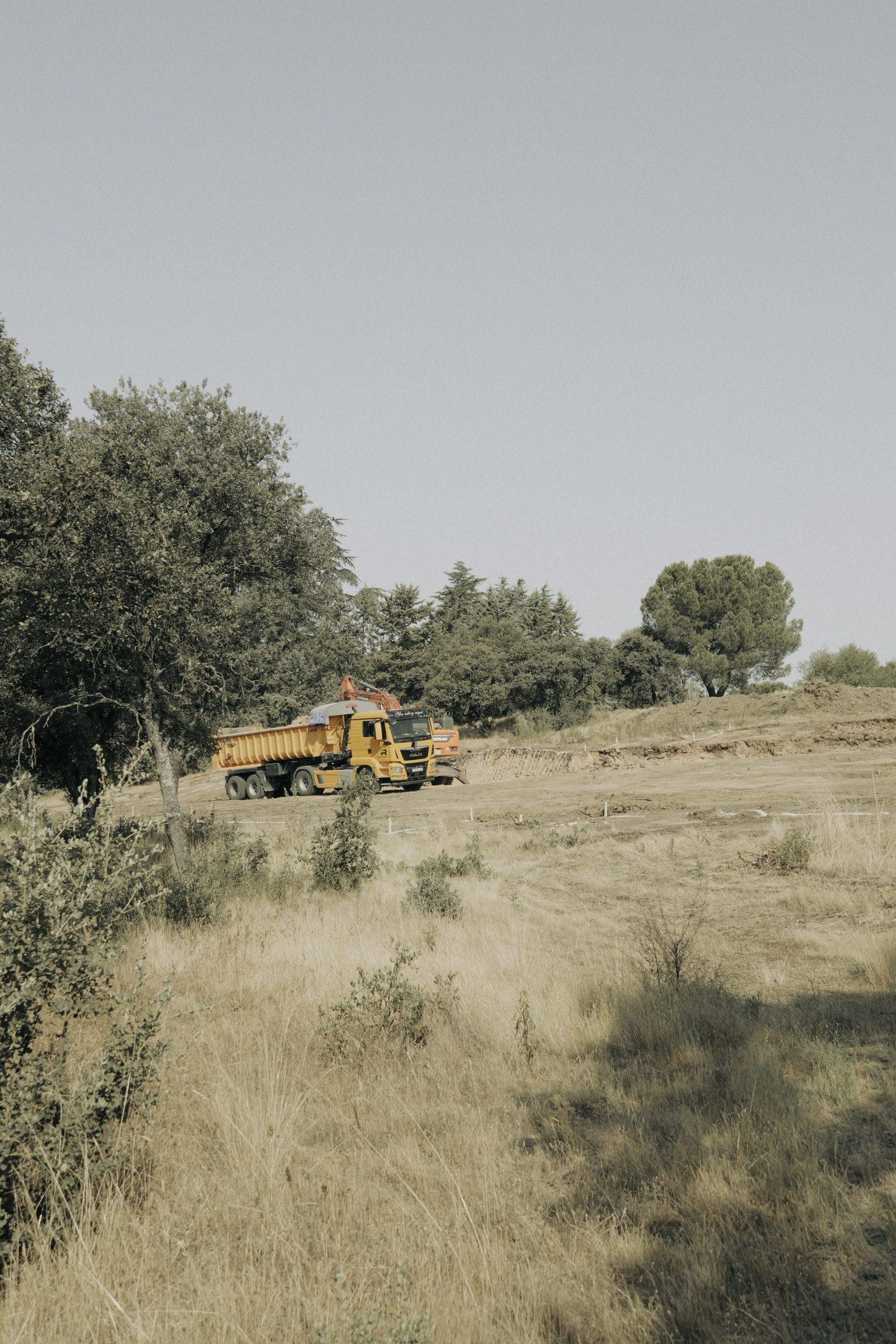 A lorry being loaded with excavated earth on the La Moraleja CN6 site