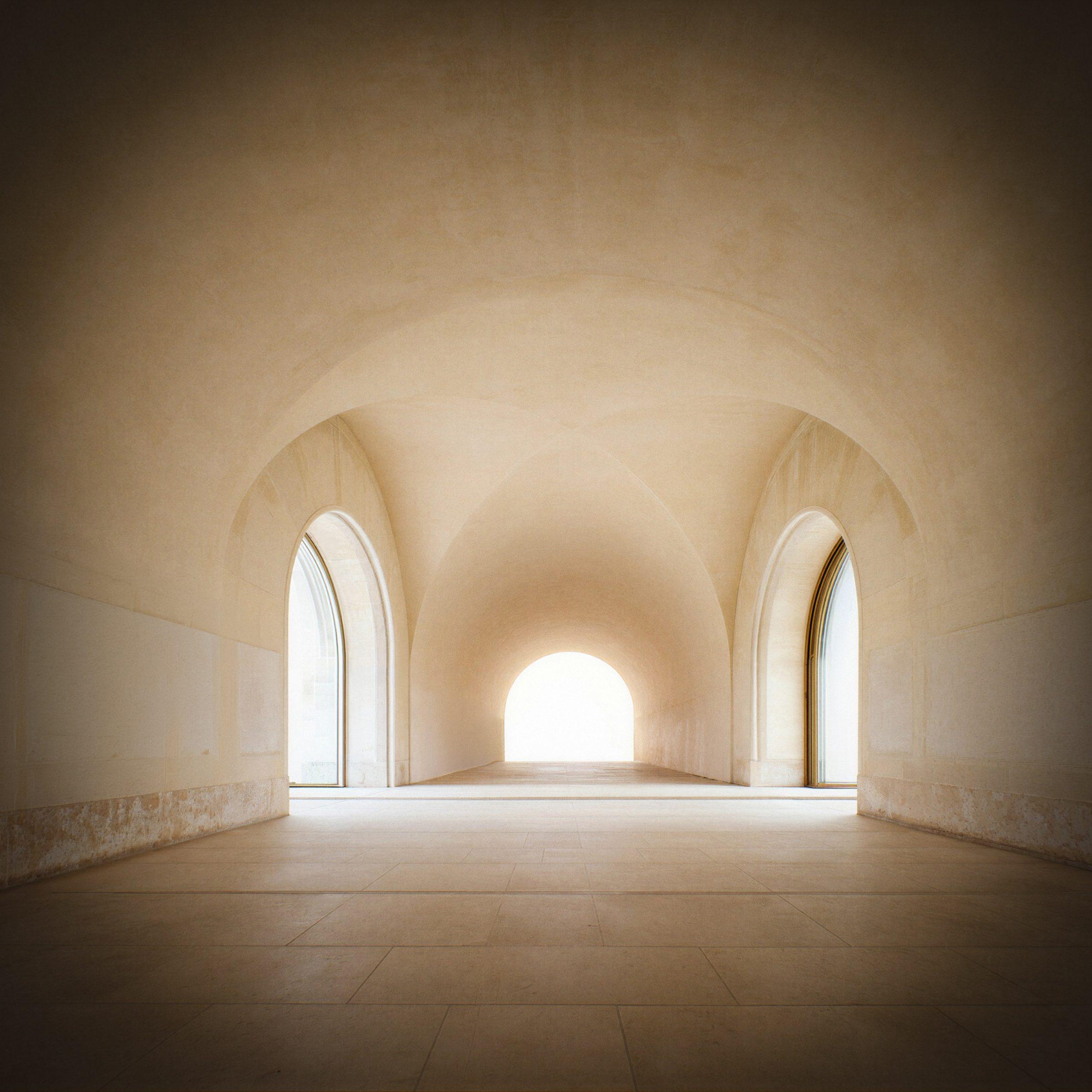 Museum of Contemporary Art, Saudi Arabia — vaulted gallery, arched openings receding toward the light